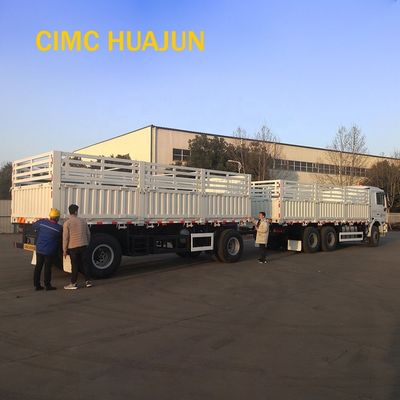 Graanvervoer 60T platte trailers met mechanische ophanging en tralies