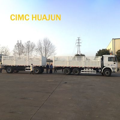 Graanvervoer 60T platte trailers met mechanische ophanging en tralies